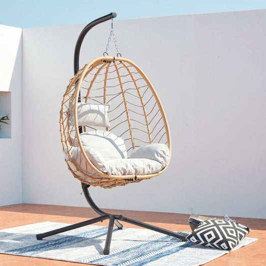 Fauteuil suspendu beige en résine et acier